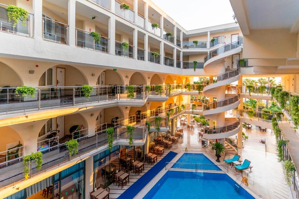 Клуб марракеш бич отель кемер. Lancora Beach Hotel. Ланкора Бич Кемер Турция. Lancora Beach 4*. Турция Кемер Дрим отель 4.